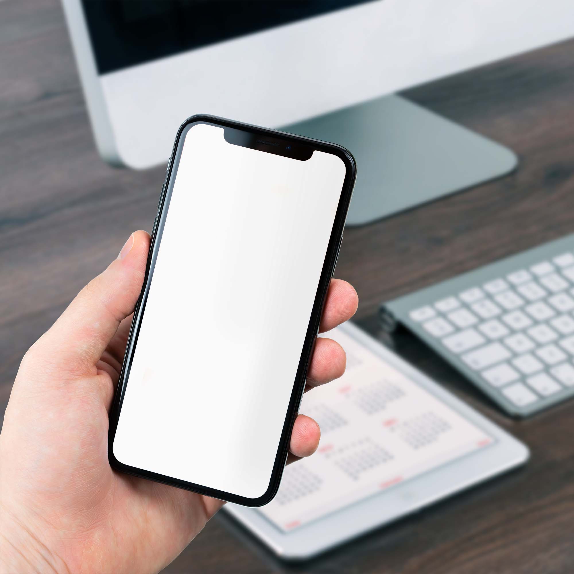 picture of a hand holding a mobile phone